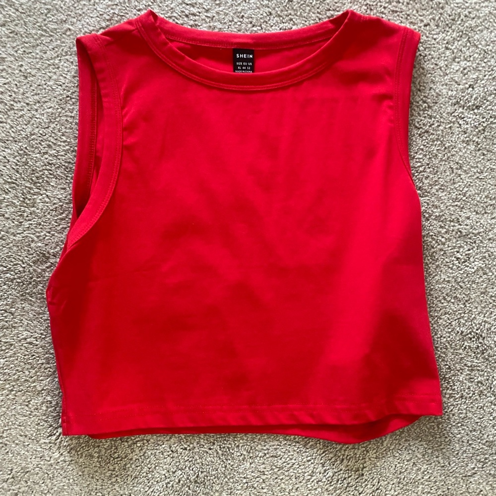 a red cropped top. Size XL